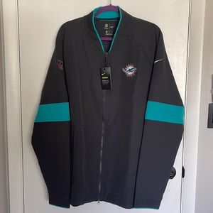 NIKE MIAMI DOLPHINS THERMA
PERFORMANCE ON-FIELD JACKET NWT
MENS SIZE 2XL